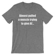 Load image into Gallery viewer, ALMOST PULLED A MUSCLE... Unisex Cotton Tee (8 colors) - The Sweetest Tee