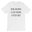 Load image into Gallery viewer, BEING AN ADULT IS LIKE FOLDING A FITTED SHEET Unisex Tee (6 colors) - The Sweetest Tee