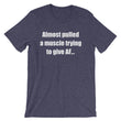 Load image into Gallery viewer, ALMOST PULLED A MUSCLE... Unisex Cotton Tee (8 colors) - The Sweetest Tee